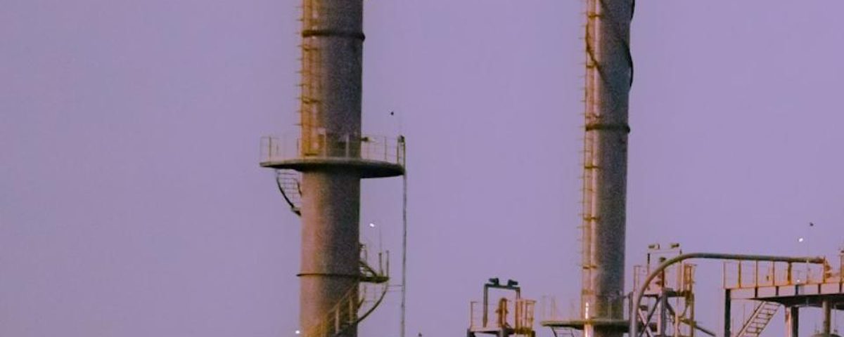 Petrochemical processing facility at dusk